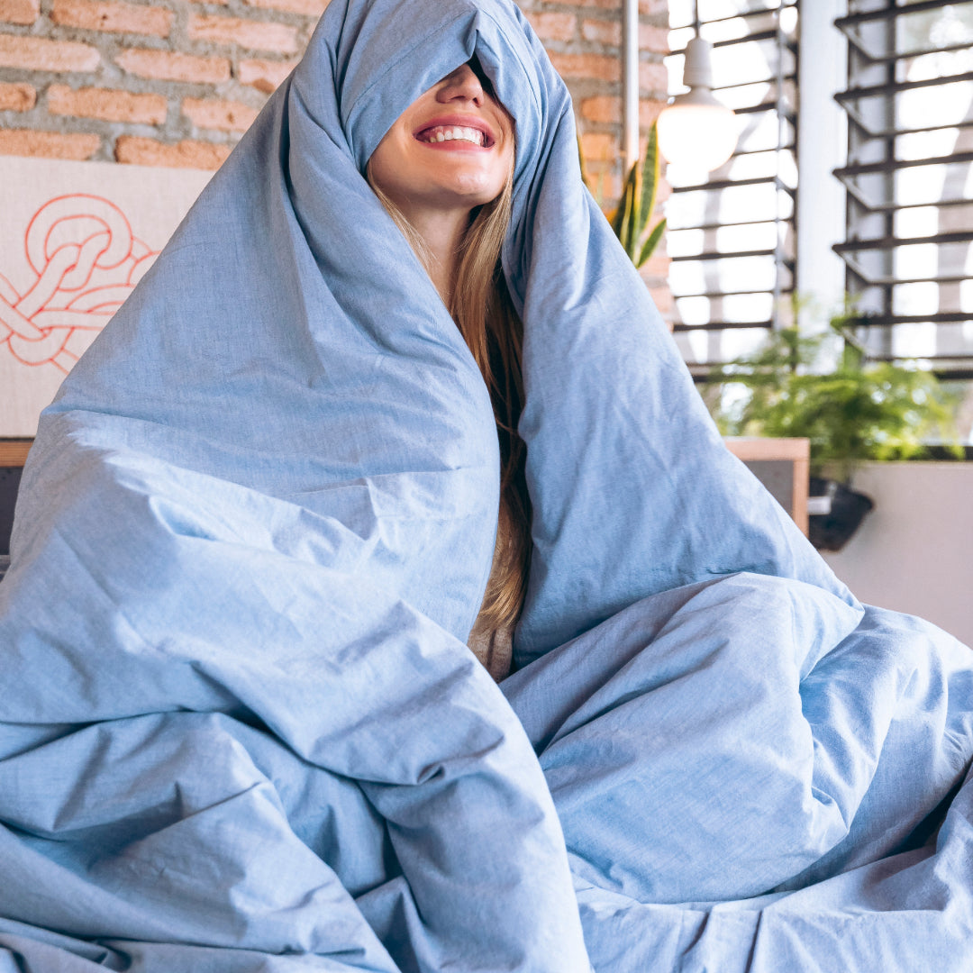 model wrapped in Organic cotton percale duvet cover in king