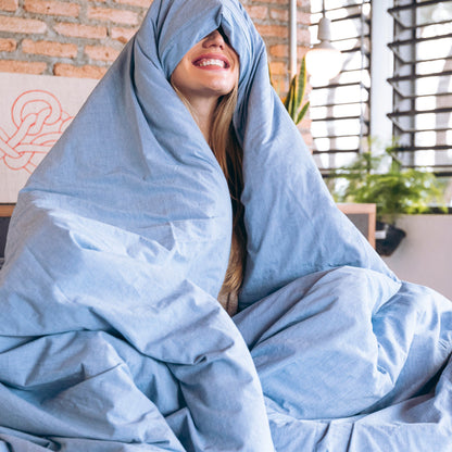 model wrapped in Organic cotton percale duvet cover in king